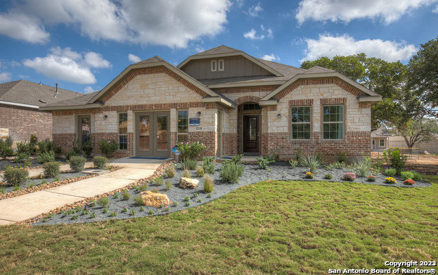 8920 Luciano Ridge Seguin, TX 78155 - Photo 1 of 1 a front view of a house with a yard