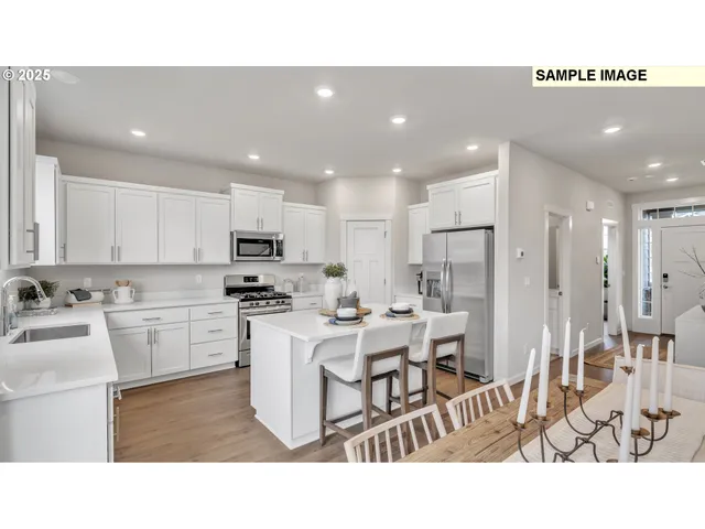 a kitchen with appliances and cabinets
