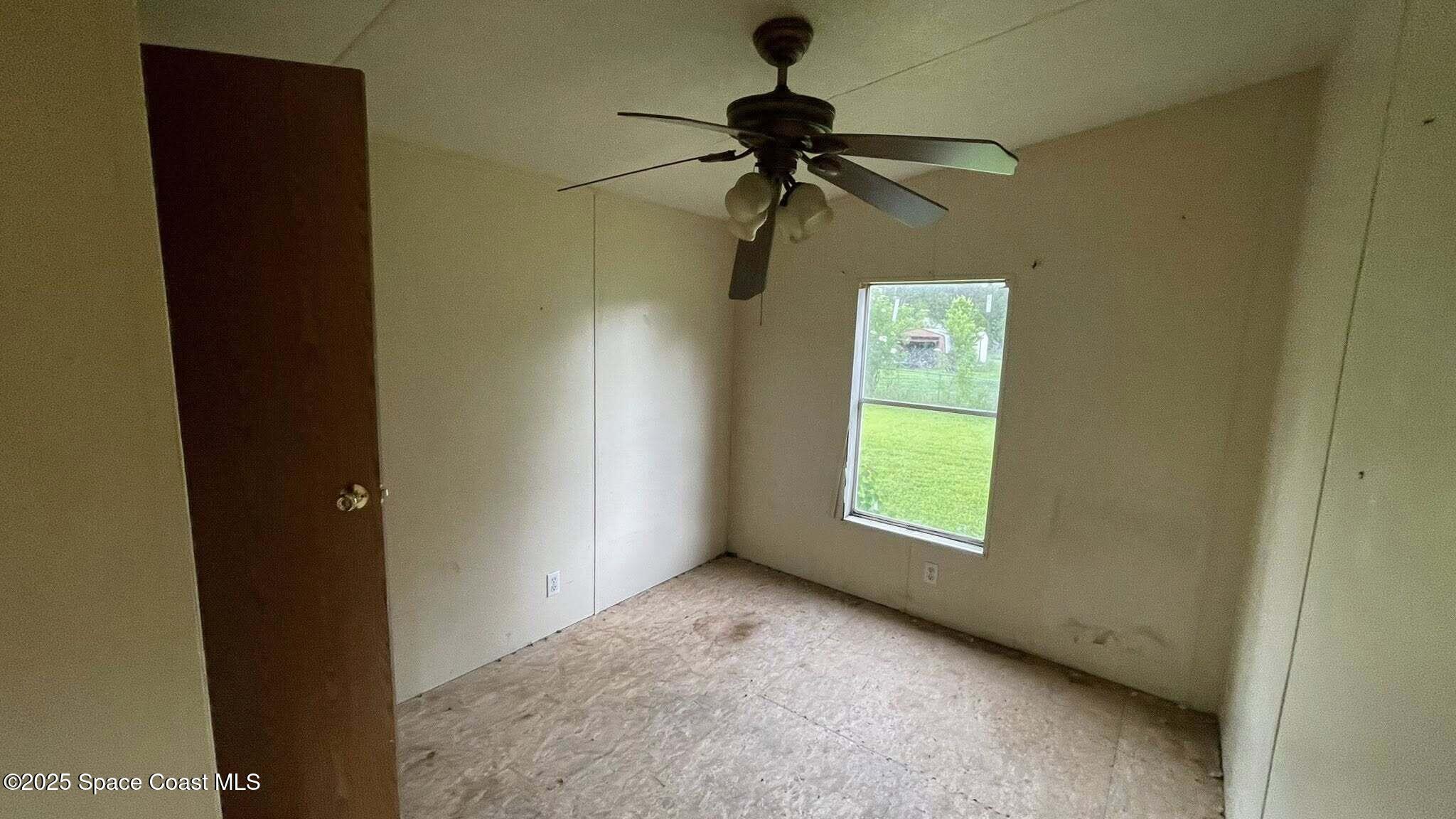 54275 Bea Road Callahan, FL 32011 - Photo 27 of 52 a view of an empty room and window