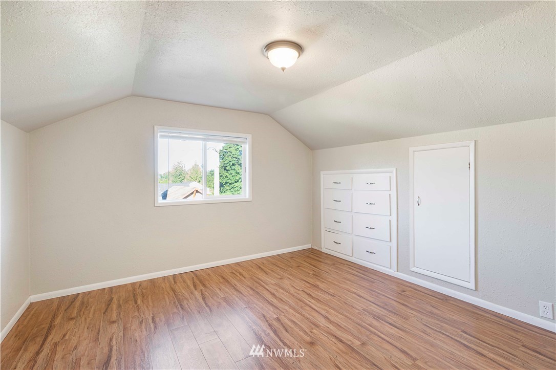 10101 James Road Southwest Rochester, WA 98579 - Photo 22 of 34 wooden floor in an empty room