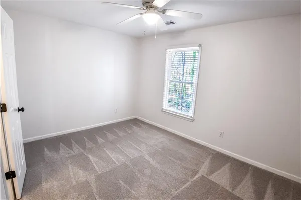 a bathroom with a double vanity sink mirror double and shower