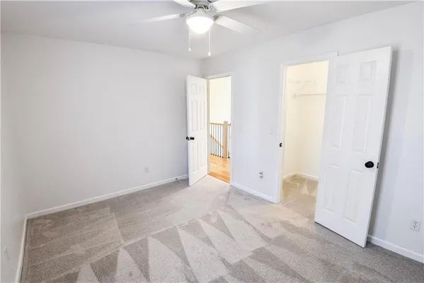 a view of wooden floor in an empty room