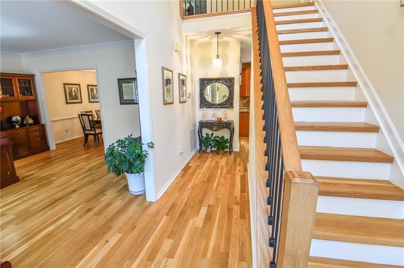 1865 Oak Tree Hollow Alpharetta, GA 30005 - Photo 4 of 35 a view of entryway with wooden floor and rug