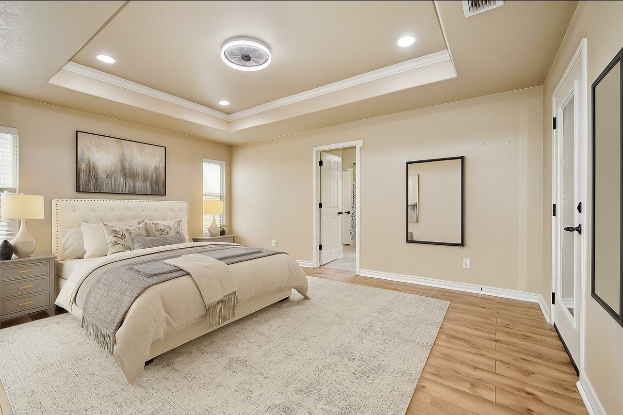 158 Pullman Road La Vernia, TX 78121 - Photo 18 of 39 a bedroom with a bed and painting on the wall