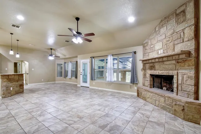a view of a hallway with a chandelier