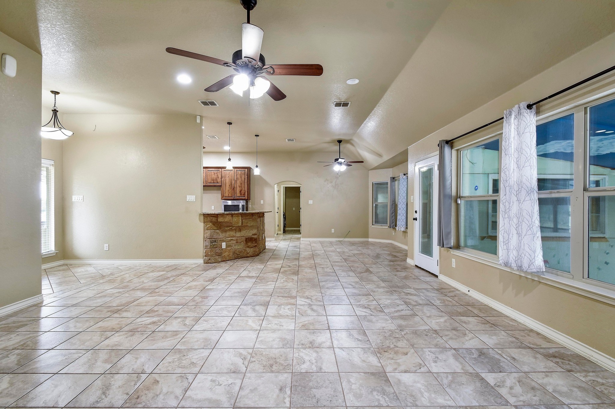 158 Pullman Road La Vernia, TX 78121 - Photo 8 of 39 a view of a hallway with a chandelier