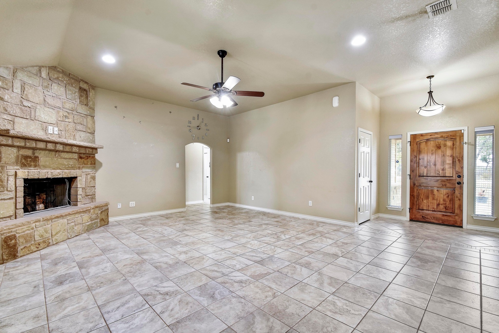 158 Pullman Road La Vernia, TX 78121 - Photo 9 of 39 a view of an empty room with a fireplace