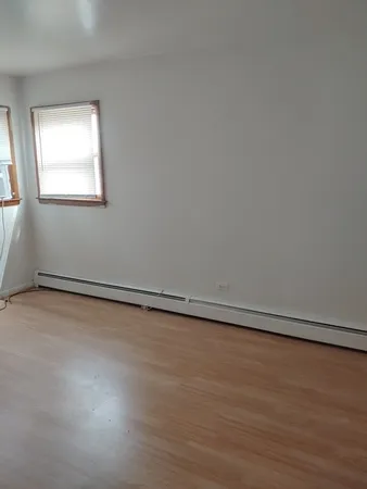 an empty room with a workbench