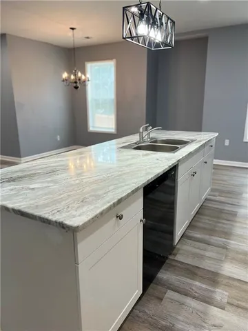 a view of kitchen and sink