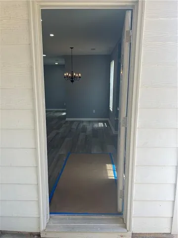 a view of an empty room and window