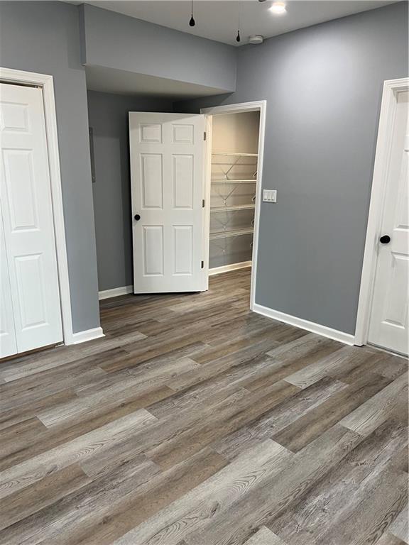 3152 Daleview Way Southwest Atlanta, GA 30331 - Photo 21 of 35 an empty room with wooden floor and closet
