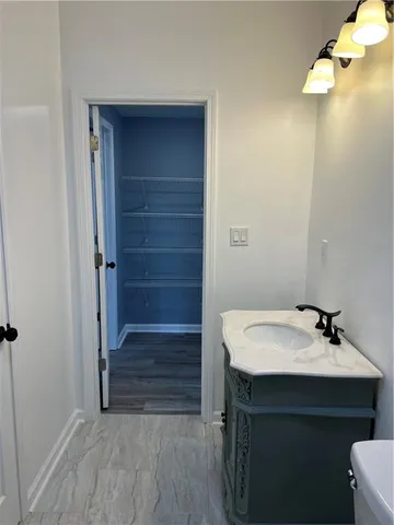 a bathroom with a toilet and shower