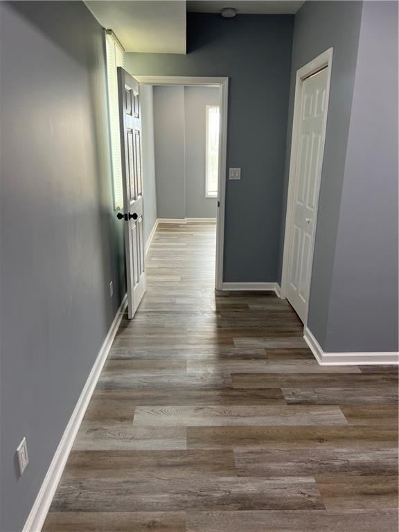 3152 Daleview Way Southwest Atlanta, GA 30331 - Photo 29 of 35 a view of a hallway with wooden floor and staircase