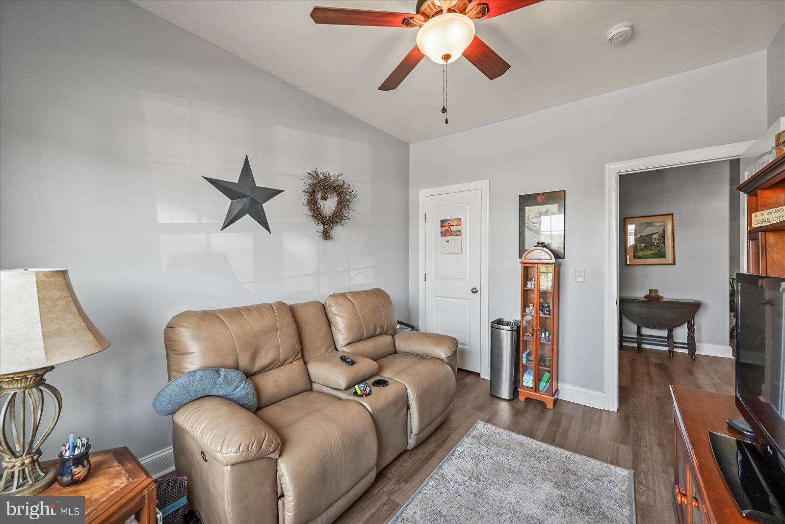 80 Evan Drive York, PA 17404 - Photo 18 of 37 a living room with furniture a ceiling fan and a rug