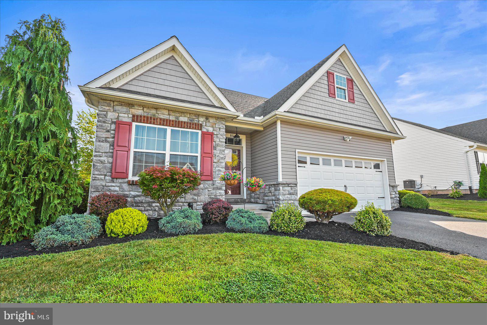 80 Evan Drive York, PA 17404 - Photo 2 of 37 a view of a house with garden and plants