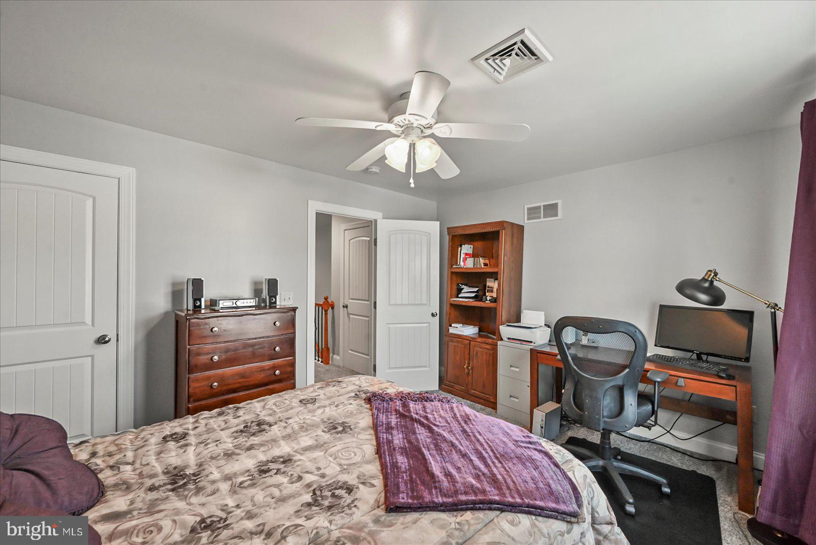 80 Evan Drive York, PA 17404 - Photo 27 of 37 a bedroom with a bed and a dresser in it