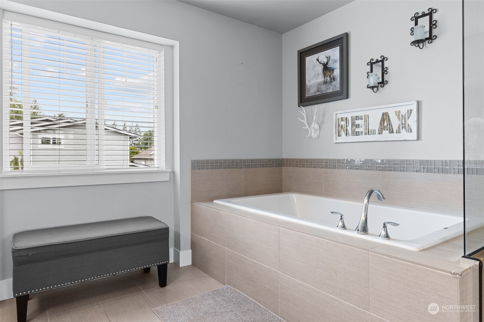 21815 86th Place West Edmonds, WA 98026 - Photo 17 of 25 a bathroom with a bathtub and window
