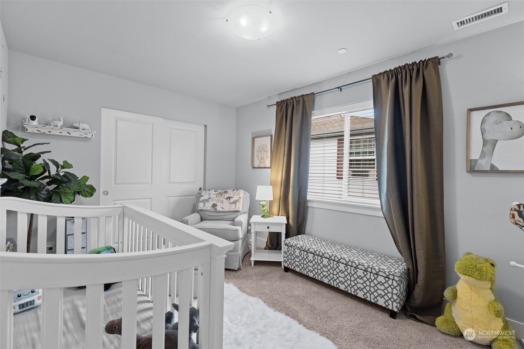 21815 86th Place West Edmonds, WA 98026 - Photo 19 of 25 a bedroom with furniture and a window
