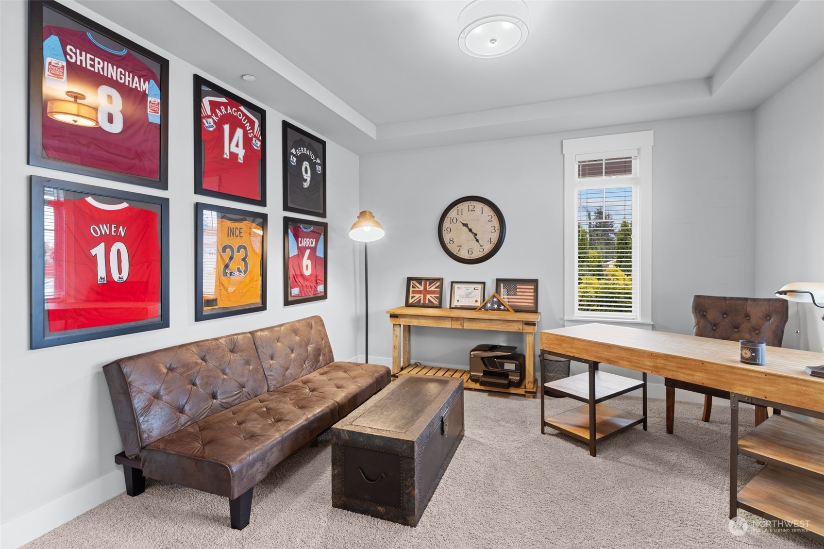 21815 86th Place West Edmonds, WA 98026 - Photo 2 of 25 a living room with furniture and a wall painting