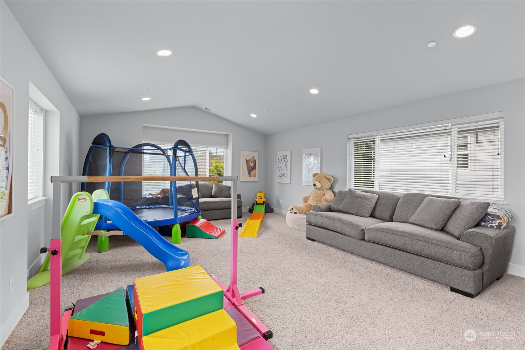 21815 86th Place West Edmonds, WA 98026 - Photo 21 of 25 a living room with furniture gym equipment and a window
