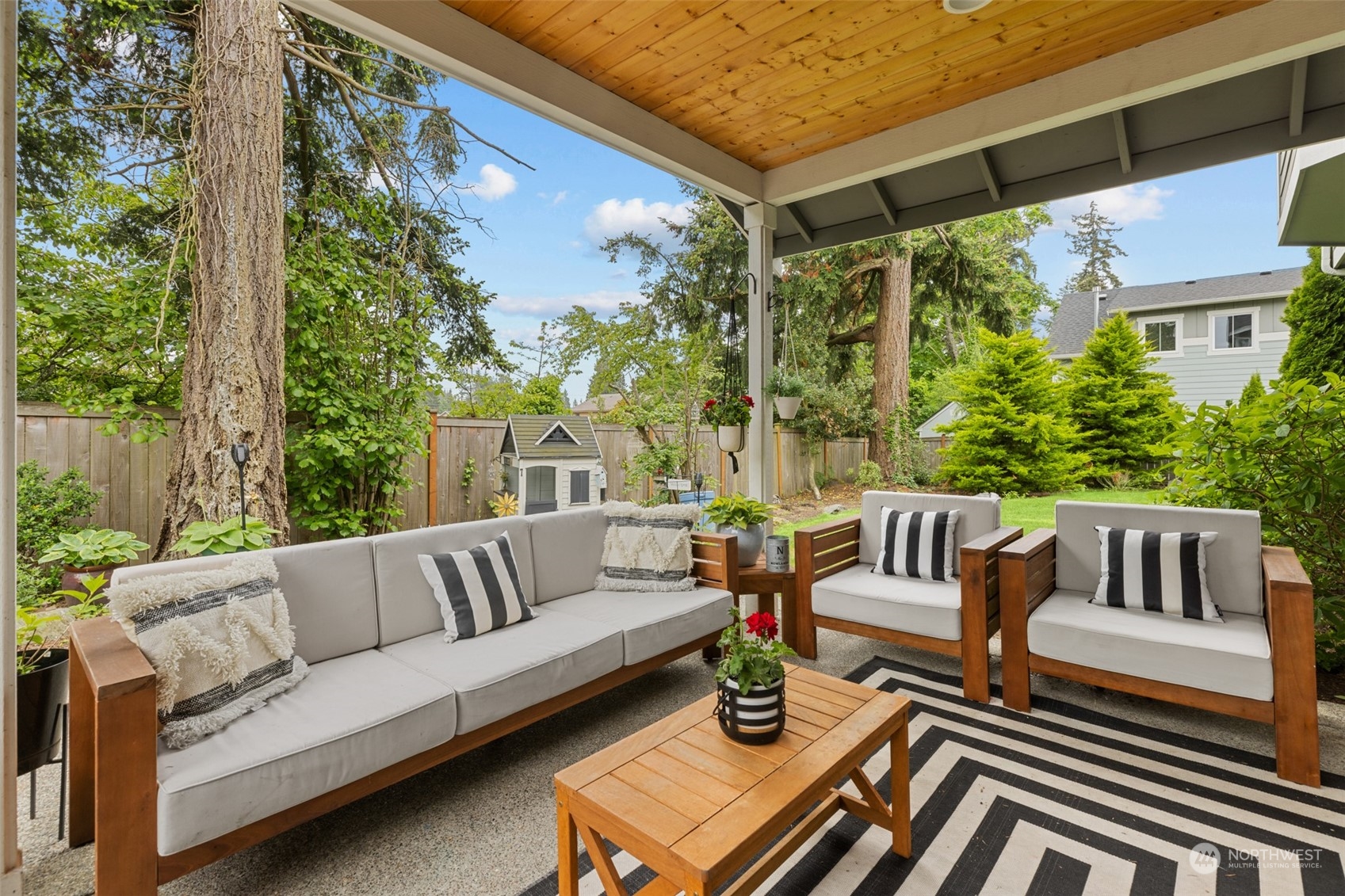 21815 86th Place West Edmonds, WA 98026 - Photo 23 of 25 a outdoor living room with furniture and a large window
