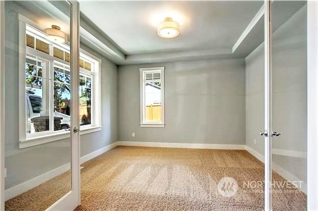 21815 86th Place West Edmonds, WA 98026 - Photo 3 of 25 an empty room with a window