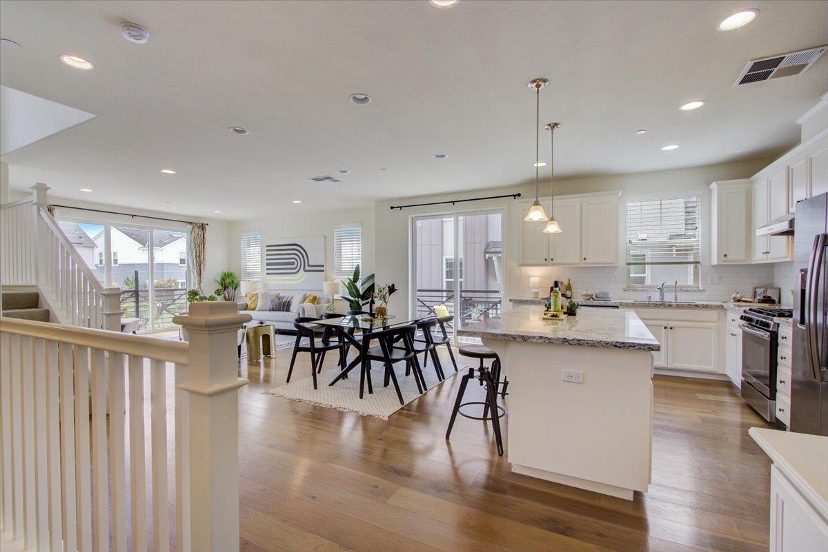 4132 Panorama Drive Dublin, CA 94568 - Photo 13 of 53 a kitchen with lots of counter top space and painting on the wall