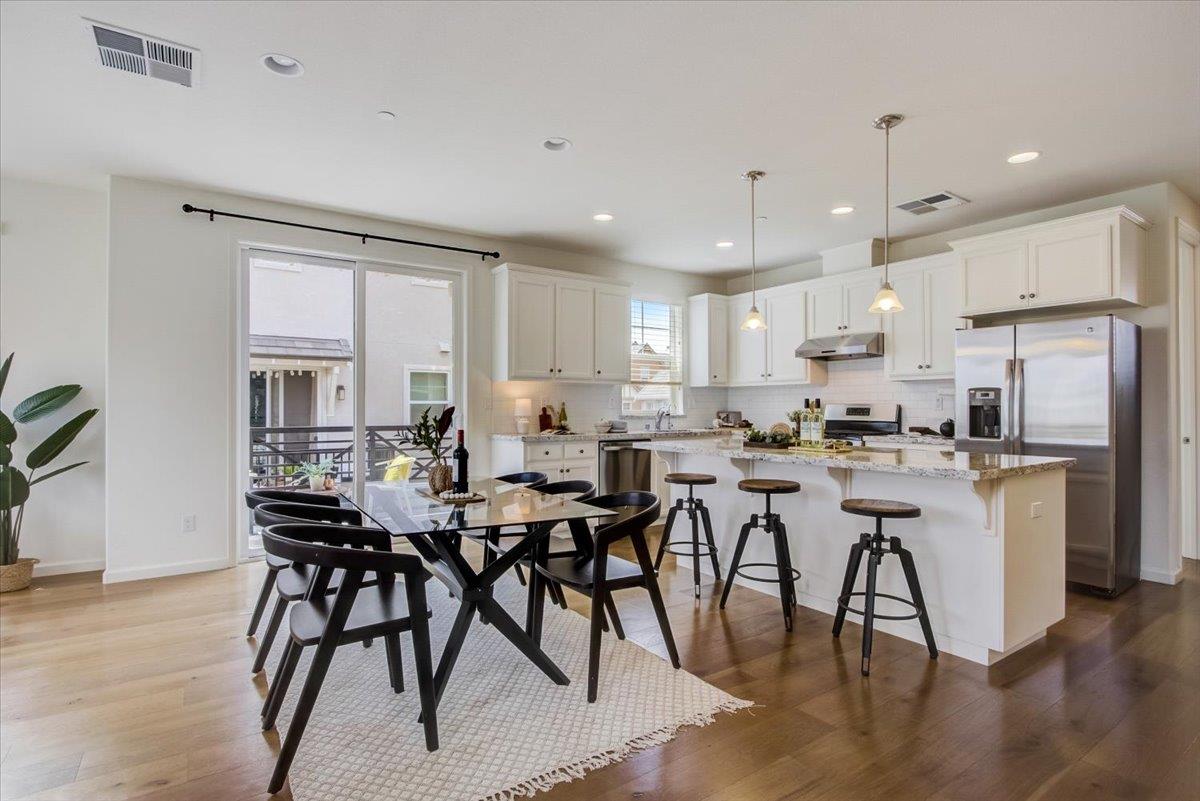 4132 Panorama Drive Dublin, CA 94568 - Photo 2 of 53 a view of kitchen with cabinets table and chairs