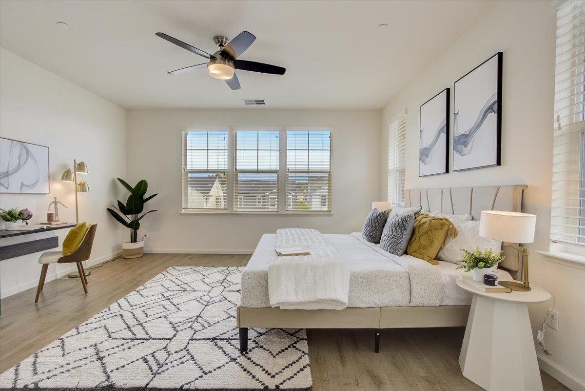 4132 Panorama Drive Dublin, CA 94568 - Photo 23 of 53 a bedroom with a bed and wooden floor