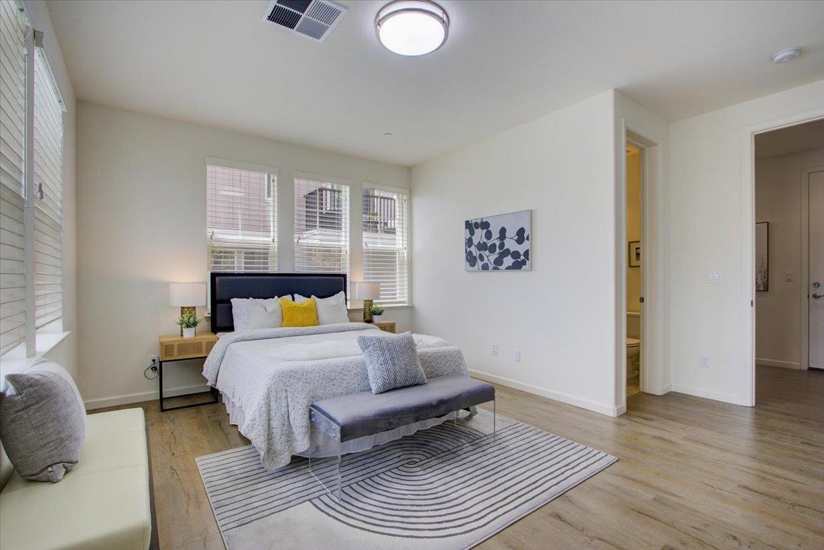 4132 Panorama Drive Dublin, CA 94568 - Photo 29 of 53 a bedroom with a bed couch and a window