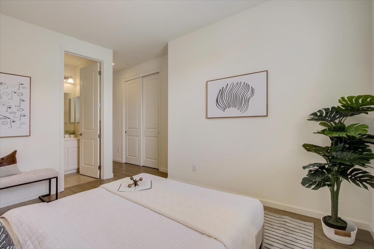 4132 Panorama Drive Dublin, CA 94568 - Photo 33 of 53 a bedroom with a bed and a potted plant
