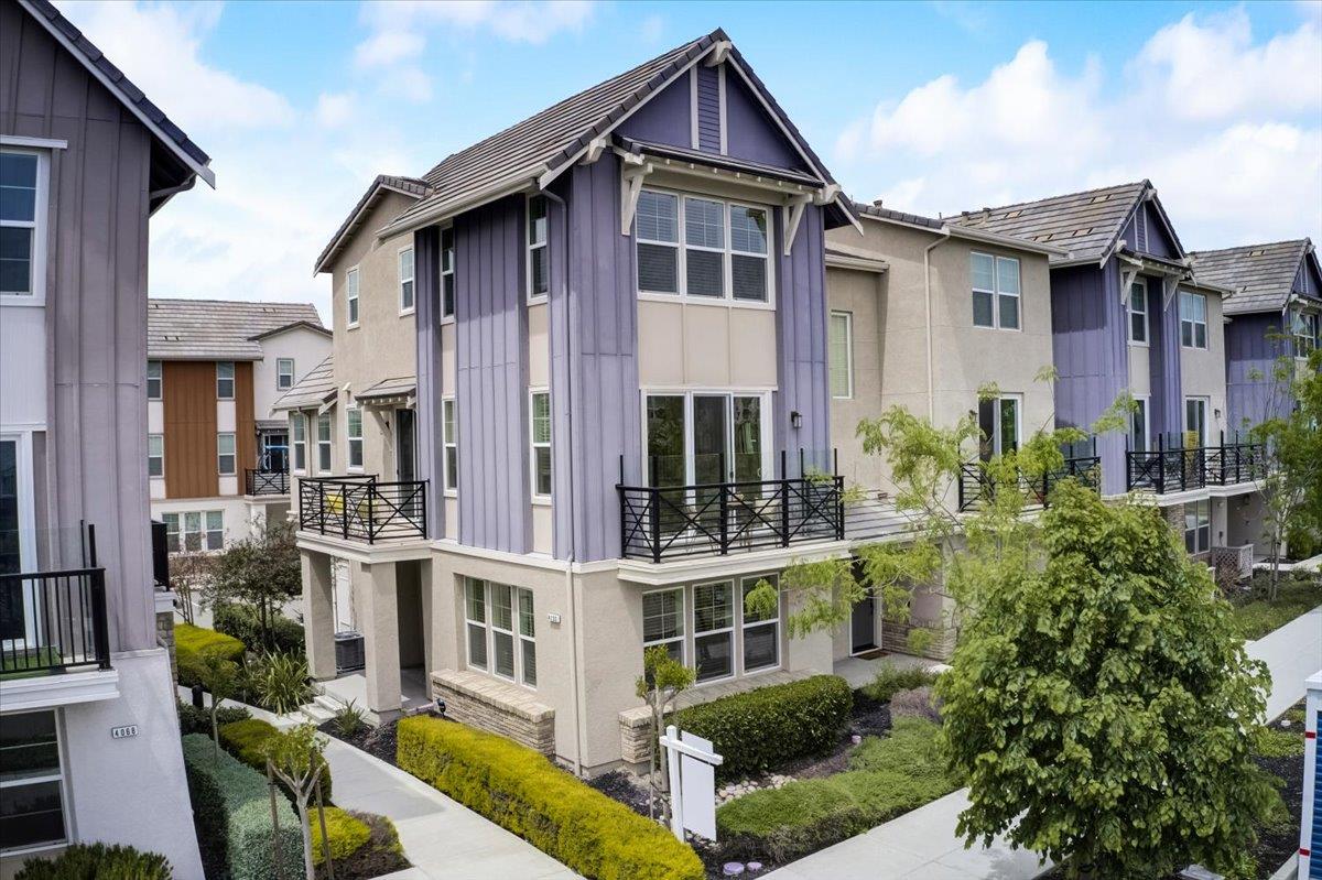 4132 Panorama Drive Dublin, CA 94568 - Photo 43 of 53 a view of a house with wooden walls and potted plants