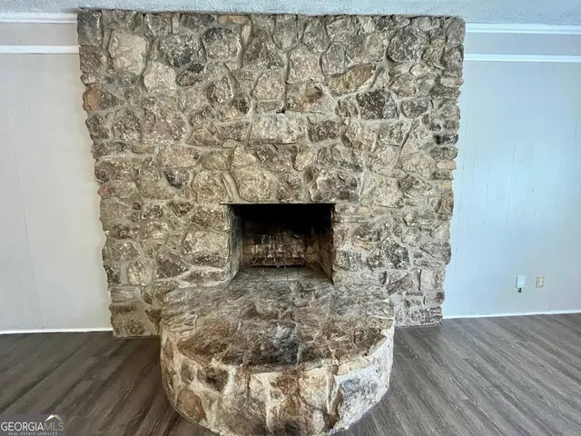 a room with a fireplace