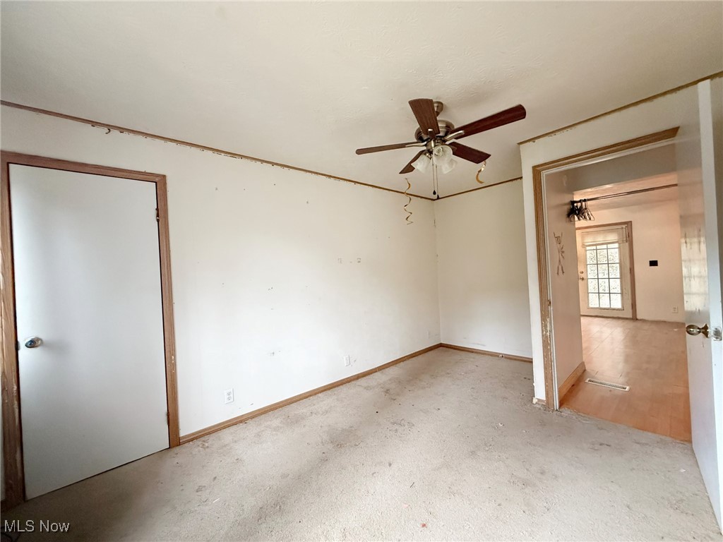 4589 Harmon Creek Road Colliers, WV 26035 - Photo 19 of 26 Unfurnished bedroom with baseboards and a ceiling fan