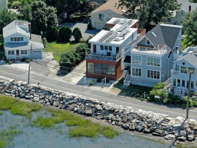70 Harbor Road Westport, CT 06880 - Photo 1 of 1 a view of multiple houses with a yard
