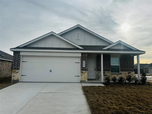 a view of a house with garage