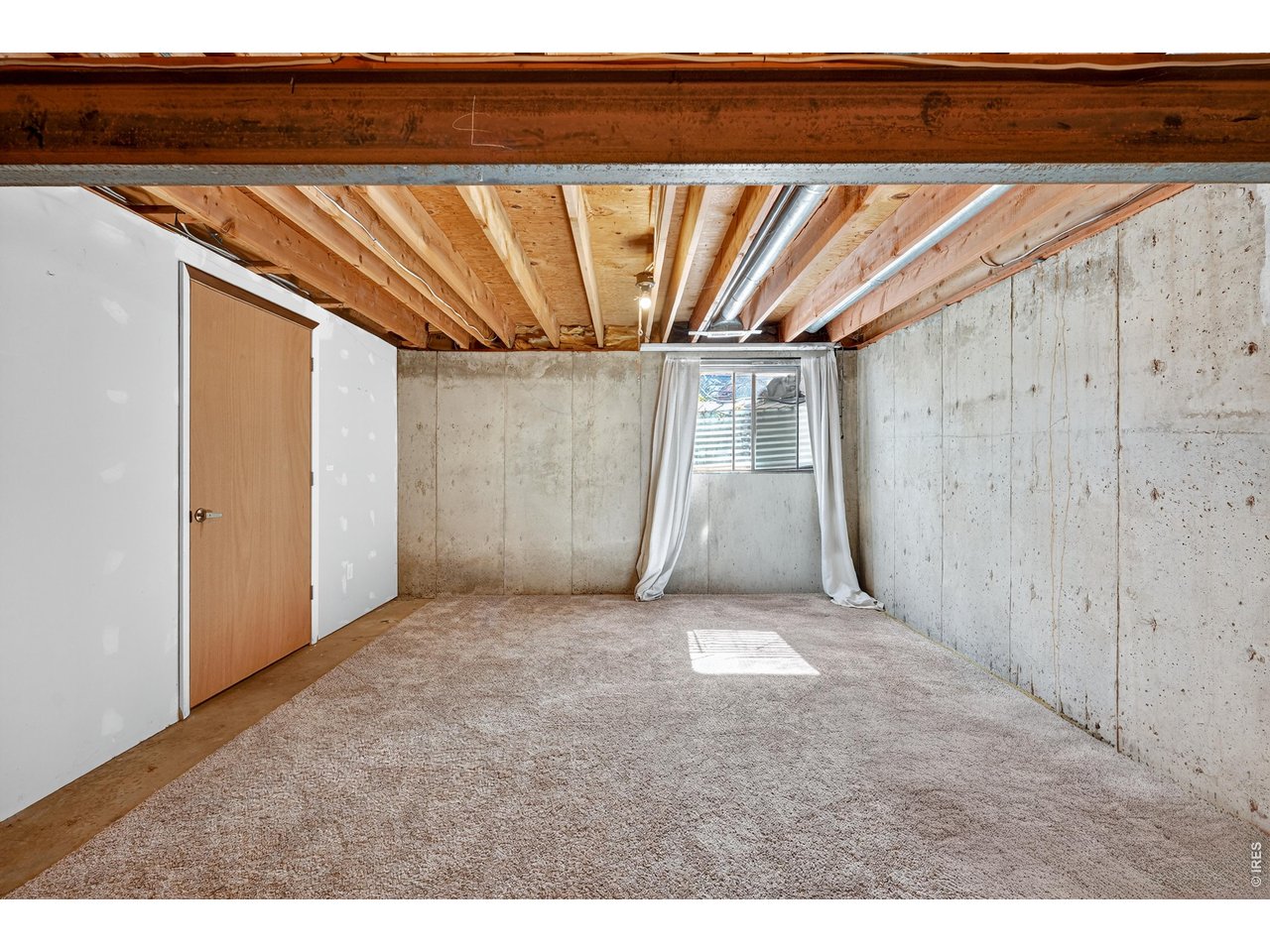4935 Sundance Square Boulder, CO 80301 - Photo 40 of 49 With abundant storage and room to grow, the unfinished recreation space is ready to evolve into a gym, studio, or fully finished extension of the home.