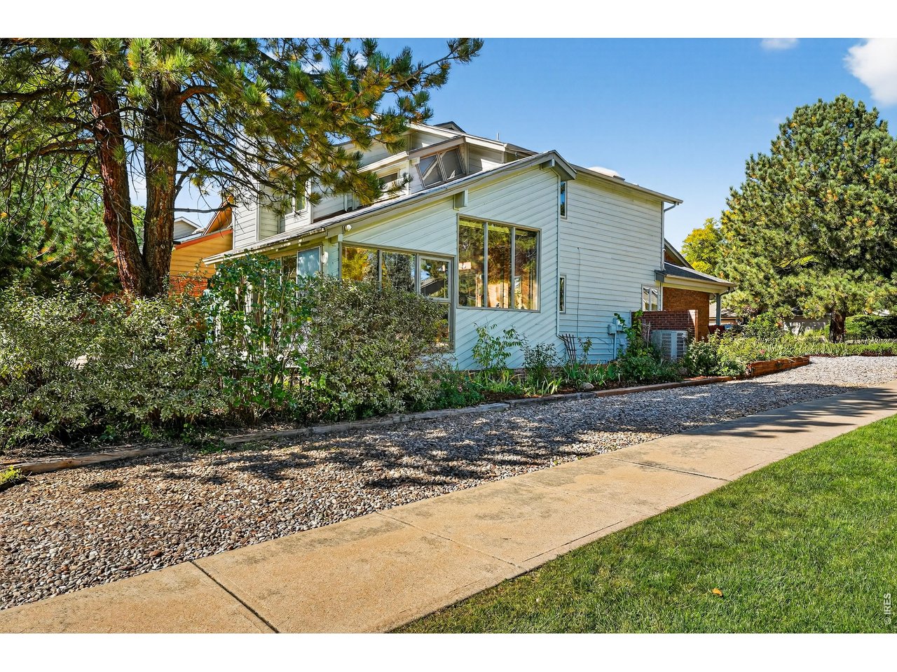 4935 Sundance Square Boulder, CO 80301 - Photo 44 of 49 Enjoy the privacy of a coveted end-unit, filled with natural light and designed for versatile living, all in a community where quiet neighborhood charm meets direct access to trails and parks.