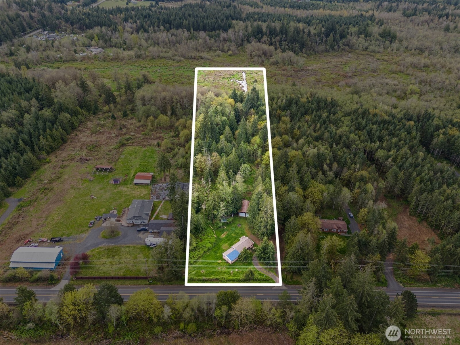 225 West Avery Road Winlock, WA 98596 - Photo 1 of 18 an aerial view of a house with a yard