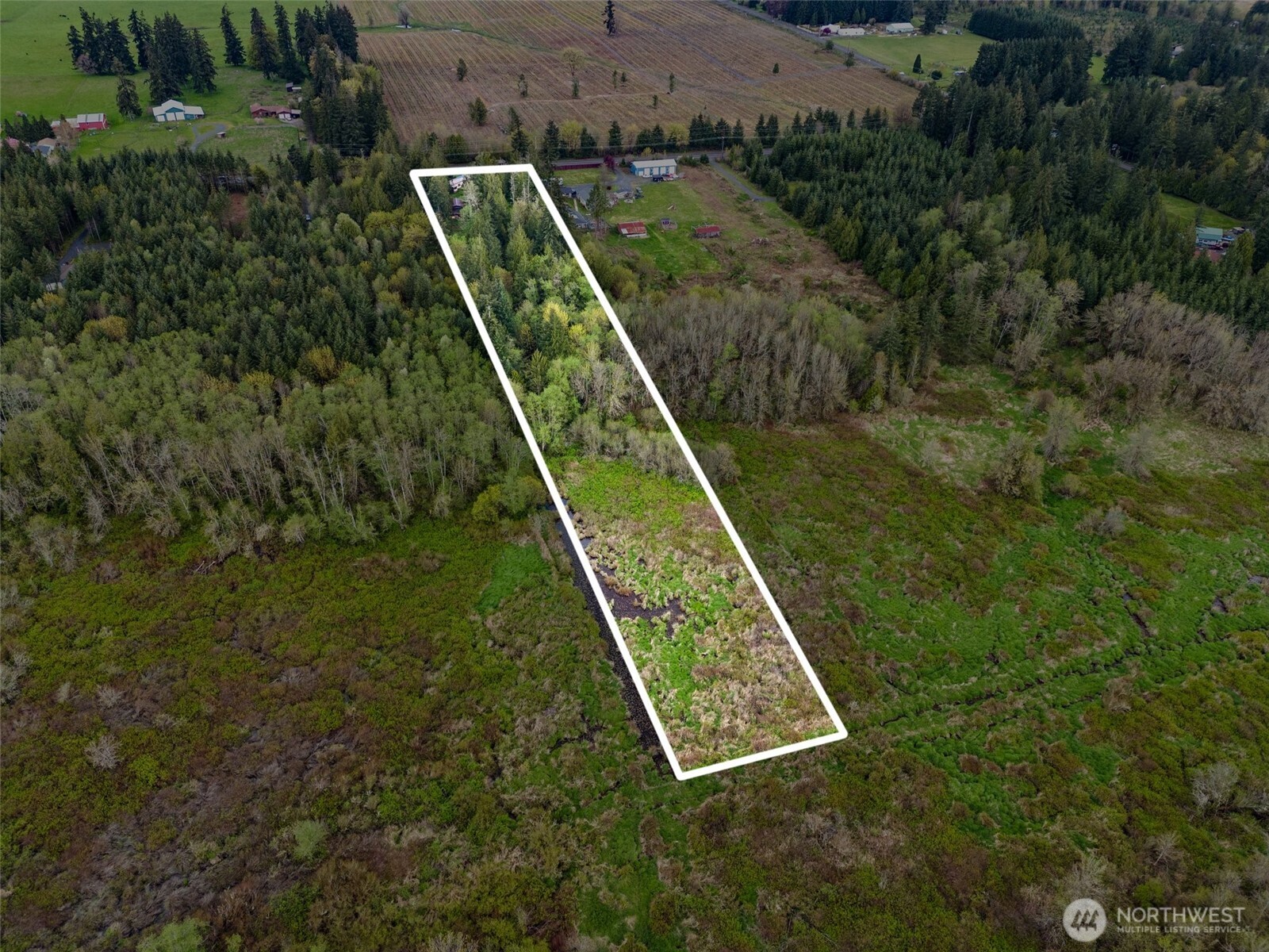 225 West Avery Road Winlock, WA 98596 - Photo 3 of 18 a view of a backyard with a wooden bridge