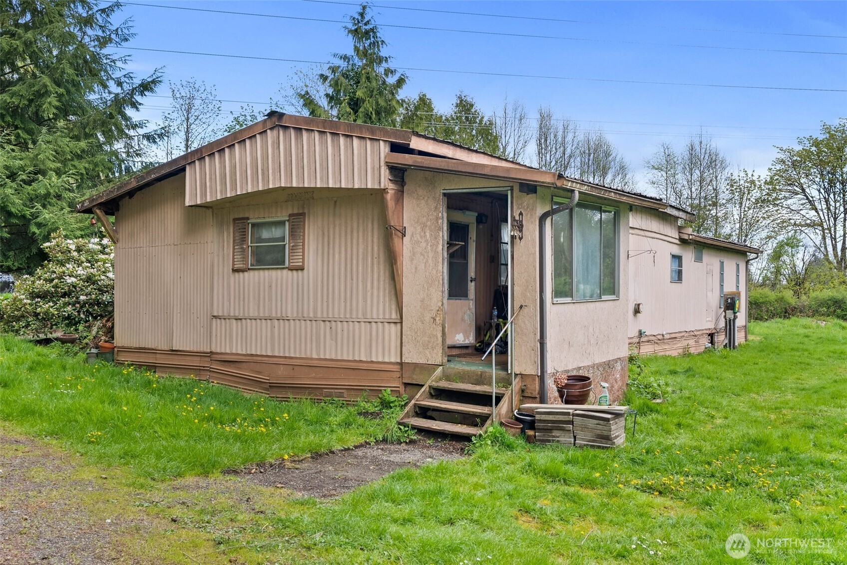 225 West Avery Road Winlock, WA 98596 - Photo 10 of 18 a view of a backyard with a garden