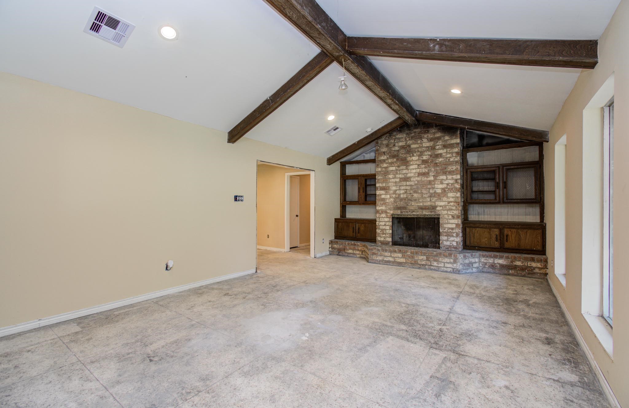 1002 Warwick Street Eagle Lake, TX 77434 - Photo 2 of 29 a view of empty room with a fireplace