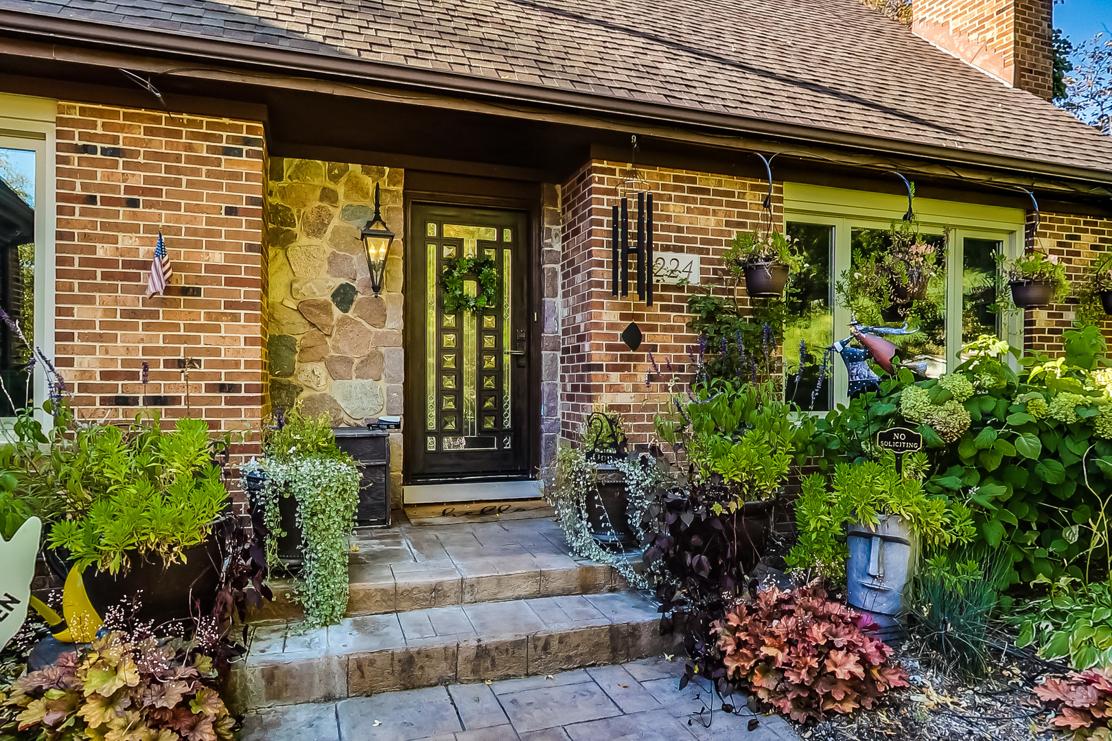 224 Perth Road Cary, IL 60013 - Photo 3 of 39 a view of yellow house with potted plants