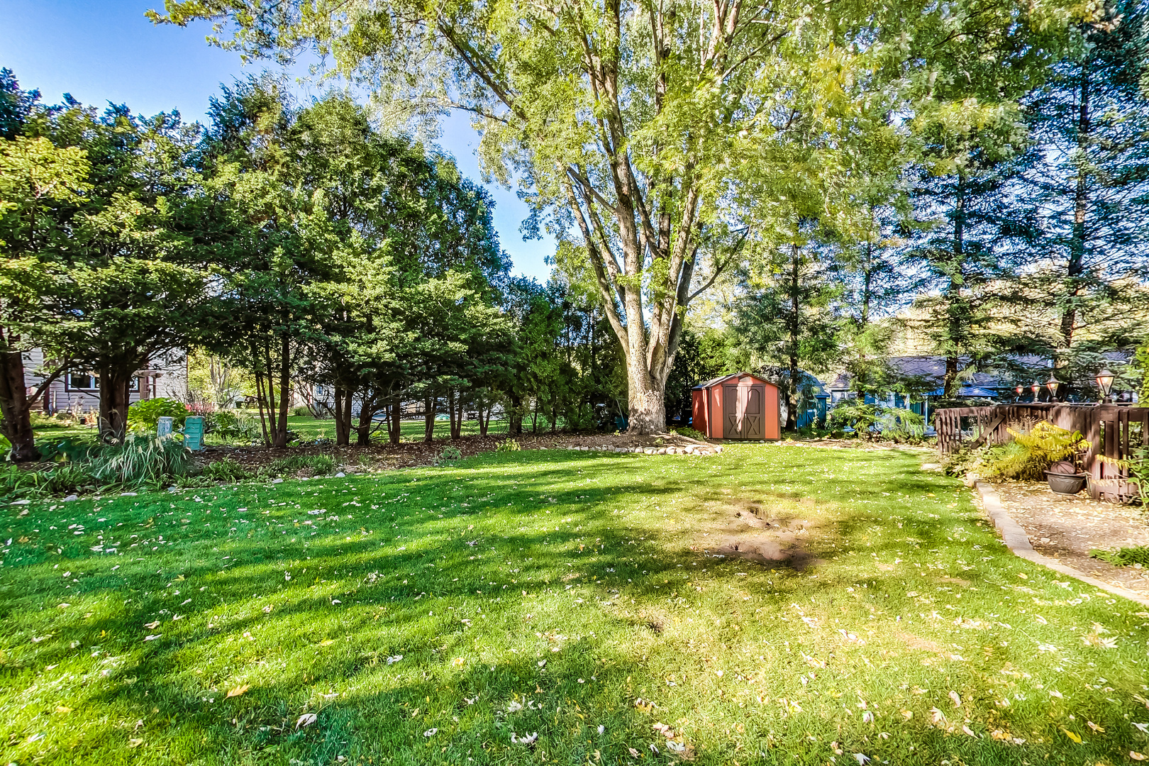 224 Perth Road Cary, IL 60013 - Photo 36 of 39 a big yard with lots of green space and trees