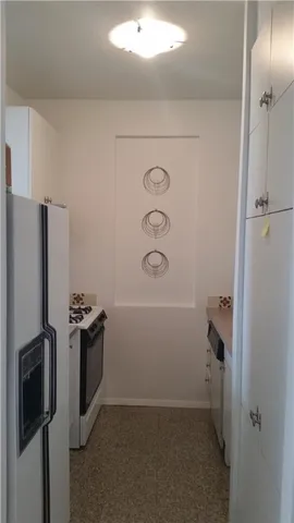 a bedroom with bed and window