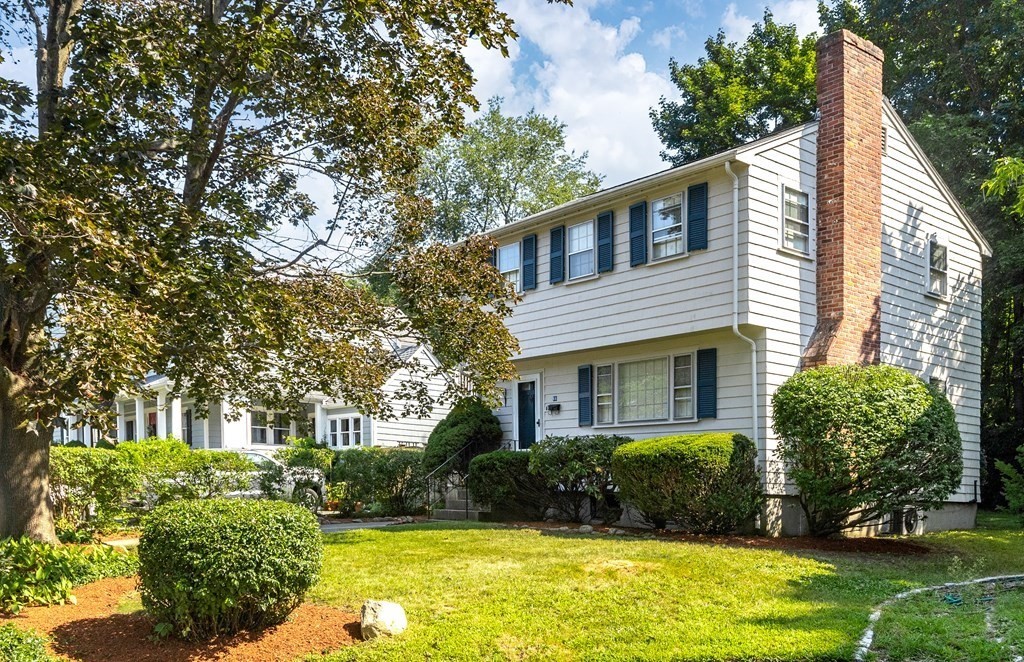 68 School Street Lexington, MA 02421 - Photo 1 of 24 a front view of a house with garden
