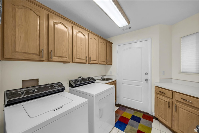 150 South Crystal Street, Unit 31 St. George, UT 84770 - Photo 20 of 20 Laundry room with cabinet space and washer and clothes dryer