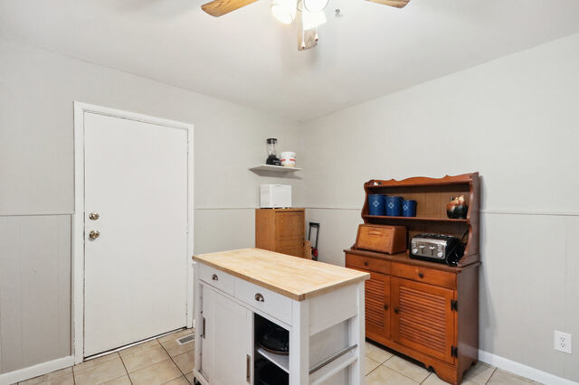 808 Westfield Drive Champaign, IL 61821 - Photo 22 of 31 a kitchen with stainless steel appliances granite countertop a stove a refrigerator and a microwave