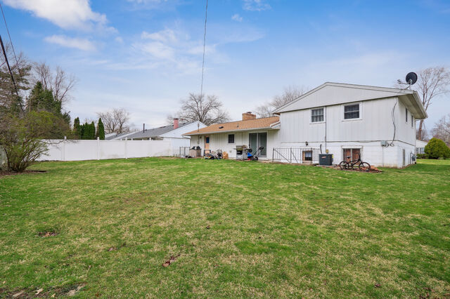 808 Westfield Drive Champaign, IL 61821 - Photo 23 of 31 a view of a house with a big yard and large trees