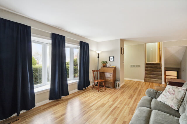 808 Westfield Drive Champaign, IL 61821 - Photo 9 of 31 a bedroom with a bed a desk and chair